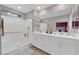 Bright bathroom features double sinks, modern fixtures, and a glass-enclosed shower at 56 Lomita Heights Dr, Las Vegas, NV 89138