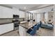 Modern kitchen featuring stainless steel appliances, a large island, and an open layout at 56 Lomita Heights Dr, Las Vegas, NV 89138