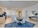 Open dining area featuring a round table, chairs, and view of the adjacent kitchen and living spaces at 5828 Sierra Medina Ave, Las Vegas, NV 89139