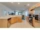 Modern kitchen with stainless steel appliances, wood cabinets, and a spacious countertop at 5828 Sierra Medina Ave, Las Vegas, NV 89139