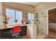 Bright bathroom with a glass door shower and a vanity counter with a window at 6587 Lucky Boy Dr, Las Vegas, NV 89110