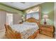 Main bedroom with detailed decor and en-suite bathroom access at 6587 Lucky Boy Dr, Las Vegas, NV 89110