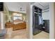 A spacious main bedroom suite featuring hardwood floors and a huge walk-in closet with custom shelves at 6587 Lucky Boy Dr, Las Vegas, NV 89110
