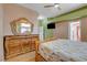 Main bedroom features laminate floors, updated decor and a view of the en-suite bath at 6587 Lucky Boy Dr, Las Vegas, NV 89110