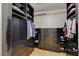 A large walk-in closet featuring custom built-ins, shelves, racks, and drawers at 6587 Lucky Boy Dr, Las Vegas, NV 89110