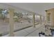 Covered back patio featuring concrete pillars with views of a private yard with exercise equipment at 7713 Shore Haven Dr, Las Vegas, NV 89128