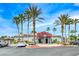 Community clubhouse with well-manicured landscaping and ample parking spaces for residents and guests at 8600 W Charleston Blvd # 2086, Las Vegas, NV 89117