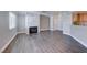 Spacious living room boasts modern flooring and a striking stone fireplace feature at 8600 W Charleston Blvd # 2086, Las Vegas, NV 89117