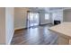 Open living area with fireplace and sliding doors to the outdoor balcony at 8600 W Charleston Blvd # 2086, Las Vegas, NV 89117