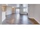 Living room with new floors, fireplace, and a sliding glass door to the patio at 8600 W Charleston Blvd # 2086, Las Vegas, NV 89117