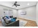 Comfortable living room featuring a plush gray sectional and neutral decor at 10158 Phelps Lake Ct, Las Vegas, NV 89148