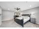 Comfortable main bedroom showcases plush carpeting, neutral walls, and a ceiling fan for climate control at 10158 Phelps Lake Ct, Las Vegas, NV 89148