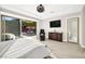 Serene main bedroom featuring access to a private outdoor patio with a pool at 12119 Castilla Rain Ave, Las Vegas, NV 89138