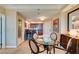 Cozy dining area adjacent to a modern kitchen and a doorway to the bathroom at 145 E Harmon Ave # 1202, Las Vegas, NV 89109