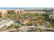 Expansive pool area featuring a lazy river and multiple sunbathing spots amid lush landscaping and resort amenities at 145 E Harmon Ave # 1202, Las Vegas, NV 89109