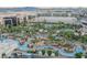 Extensive pool complex showcasing lazy rivers, cabanas, and palm trees, creating an inviting outdoor oasis for relaxation at 145 E Harmon Ave # 1202, Las Vegas, NV 89109