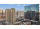 An aerial view features multiple hotels on the Las Vegas strip during the day with clear skies at 145 E Harmon Ave # 2603, Las Vegas, NV 89109