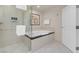 Bright bathroom with walk-in shower, a soaking tub, and a door to the toilet room at 145 E Harmon Ave # 2603, Las Vegas, NV 89109