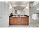 Bathroom features a double vanity with granite countertops, and a glass shower at 145 E Harmon Ave # 2603, Las Vegas, NV 89109