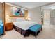 Relaxing bedroom with a luxurious king bed, sleek nightstands, and an ensuite bathroom at 145 E Harmon Ave # 2603, Las Vegas, NV 89109