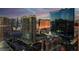 An expansive city view showcases the vibrant Las Vegas skyline at dusk at 145 E Harmon Ave # 2603, Las Vegas, NV 89109