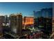 The modern Las Vegas cityscape with hotels and casinos brightly lit in the evening at 145 E Harmon Ave # 2603, Las Vegas, NV 89109