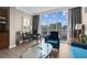 Charming condo with kitchenette, a dining area, and floor-to-ceiling windows offering stunning city skyline views at 145 E Harmon Ave # 2603, Las Vegas, NV 89109
