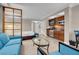 Bright open floor plan with bedroom, living area, and kitchenette featuring sleek flooring and modern design at 145 E Harmon Ave # 2603, Las Vegas, NV 89109