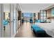 Inviting living room featuring modern furnishings, stylish decor, and city views from a large window at 145 E Harmon Ave # 2603, Las Vegas, NV 89109