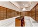 Mail room with rows of mailboxes and a counter in a well-lit space at 145 E Harmon Ave # 2603, Las Vegas, NV 89109