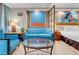 This main bedroom includes modern furnishings and a coffee table between the bed and sofa at 145 E Harmon Ave # 2603, Las Vegas, NV 89109