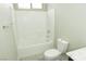 Bright bathroom featuring a clean, tiled shower-tub combination and modern fixtures at 1617 Meadow Bluffs Ave, Henderson, NV 89014