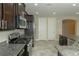 Spacious kitchen featuring stainless steel appliances and tile flooring at 1617 Meadow Bluffs Ave, Henderson, NV 89014