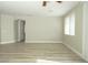 Bright living room with hardwood floors and large windows at 1617 Meadow Bluffs Ave, Henderson, NV 89014