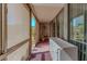 Enclosed balcony featuring lots of natural light and carpet floors at 205 E Harmon Ave # 121, Las Vegas, NV 89169