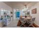 Dining Area with tile floors, decorative mirror and direct access to kitchen at 205 E Harmon Ave # 121, Las Vegas, NV 89169