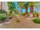 Beautifully landscaped grounds with mature palm trees at 205 E Harmon Ave # 121, Las Vegas, NV 89169