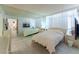 Main bedroom featuring a large mirror, neutral decor and tile floors at 205 E Harmon Ave # 121, Las Vegas, NV 89169