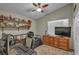 Bedroom with vaulted ceiling includes a wooden dresser and open storage shelves at 2096 Fallsburg Way, Henderson, NV 89002