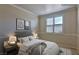 Comfortable bedroom featuring a plush bed and neutral decor at 211 Crown Imperial St, Henderson, NV 89074