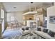 Virtually staged living room and kitchen with new decor and modern finishes at 211 Crown Imperial St, Henderson, NV 89074