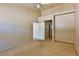 Primary bedroom featuring access to ensuite bath and walk in closet at 211 Crown Imperial St, Henderson, NV 89074