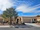 Charming single-story home featuring a well-maintained front yard and a spacious two-car garage at 2245 Barbers Point Pl, Las Vegas, NV 89134