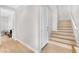 Entryway featuring a staircase, light wood floors, and neutral wall color at 2503 Cracked Stone St, Henderson, NV 89044