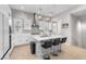 Beautiful kitchen with white cabinets, stainless steel appliances, and a large kitchen island with marble accents at 2503 Cracked Stone St, Henderson, NV 89044