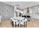 Bright and airy kitchen with a large island, modern appliances, and an adjacent dining area at 2503 Cracked Stone St, Henderson, NV 89044