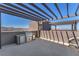 Rooftop patio with a built-in outdoor kitchen and stainless steel grill and fridge at 2503 Cracked Stone St, Henderson, NV 89044