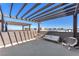 Spacious rooftop patio with modern seating and a pergola, perfect for outdoor relaxation at 2503 Cracked Stone St, Henderson, NV 89044