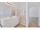 Clean bathroom with a single sink vanity and glass-enclosed shower at 2617 Tanagrine Dr, North Las Vegas, NV 89084