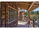 Balcony offers a glimpse of the surrounding forest and stone design elements at 264 Crestview Dr, Las Vegas, NV 89124